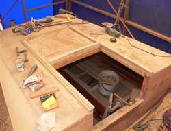 New rails for the hatch are being fitted...